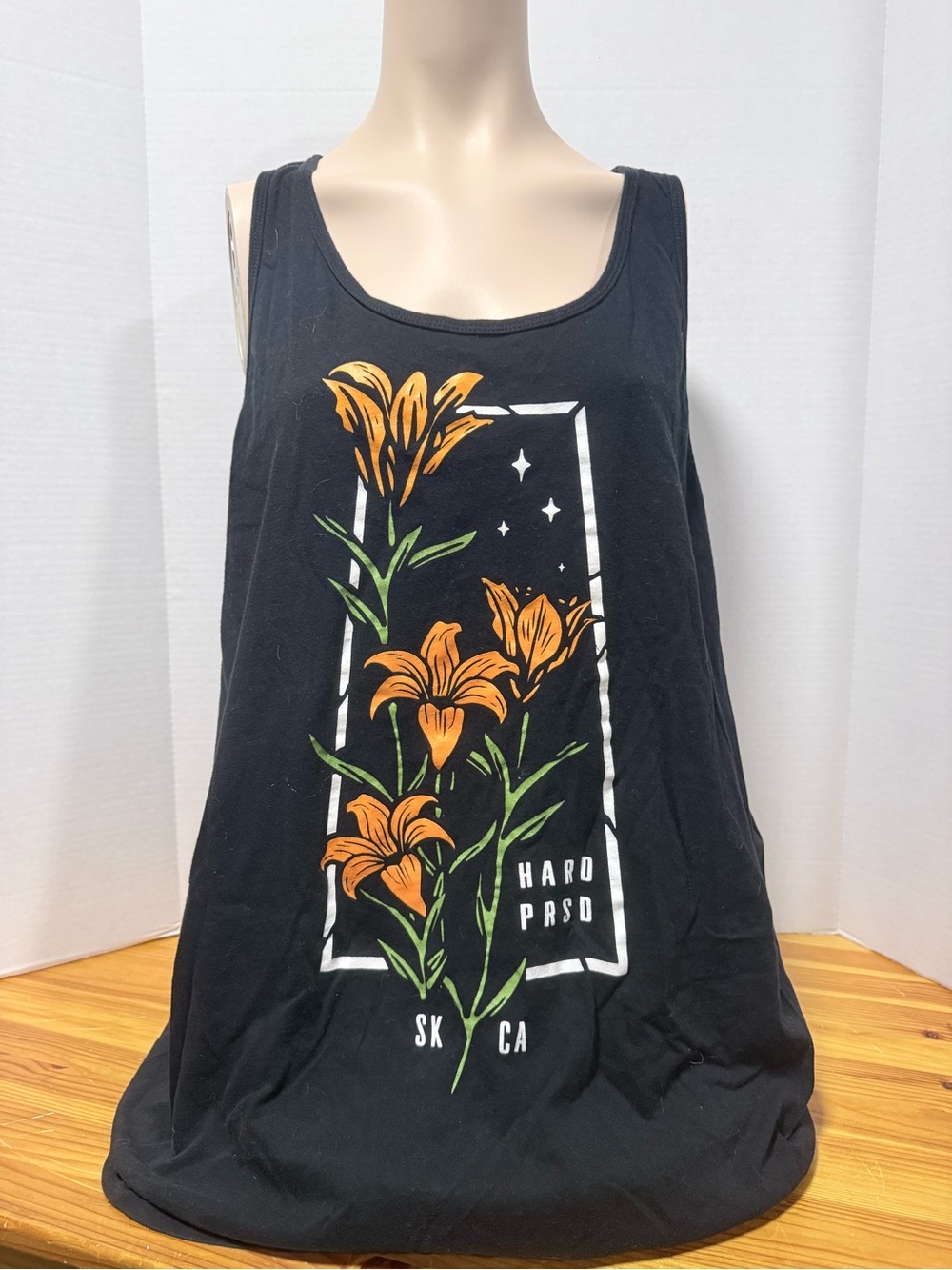 Hard Pressed Black Tank Top with Orange Lily Saskatchewan Graphic